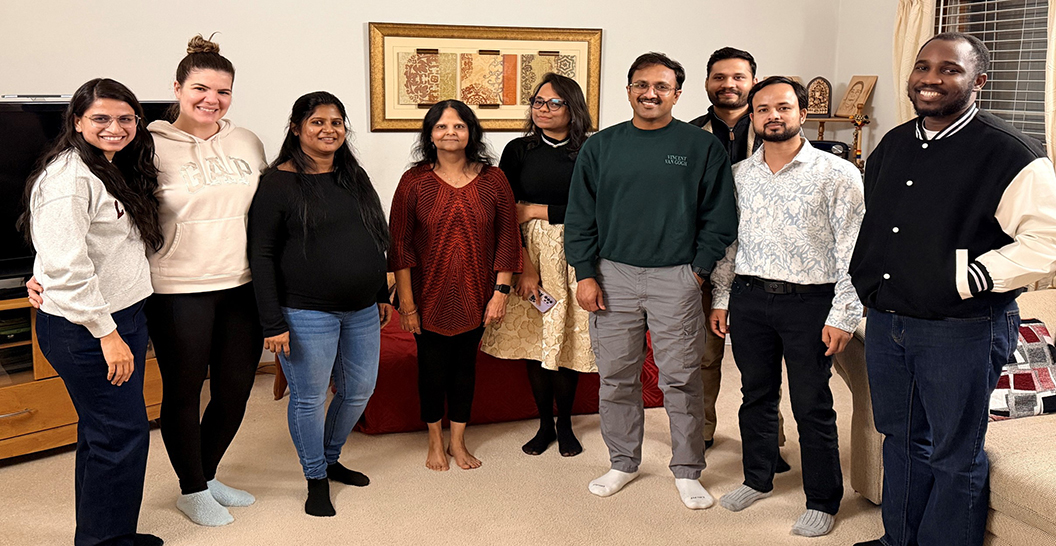 Lab members pose fr a photo in Dr. Dayal's living room